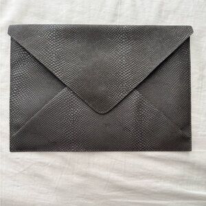 La Dagagerie 
Gray embossed snakeskin 
Envelope Clutch